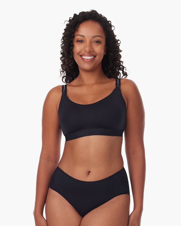 Translation missing: en.Woman wearing black Momcozy nursing bra, highlighting support and comfort for breastfeeding